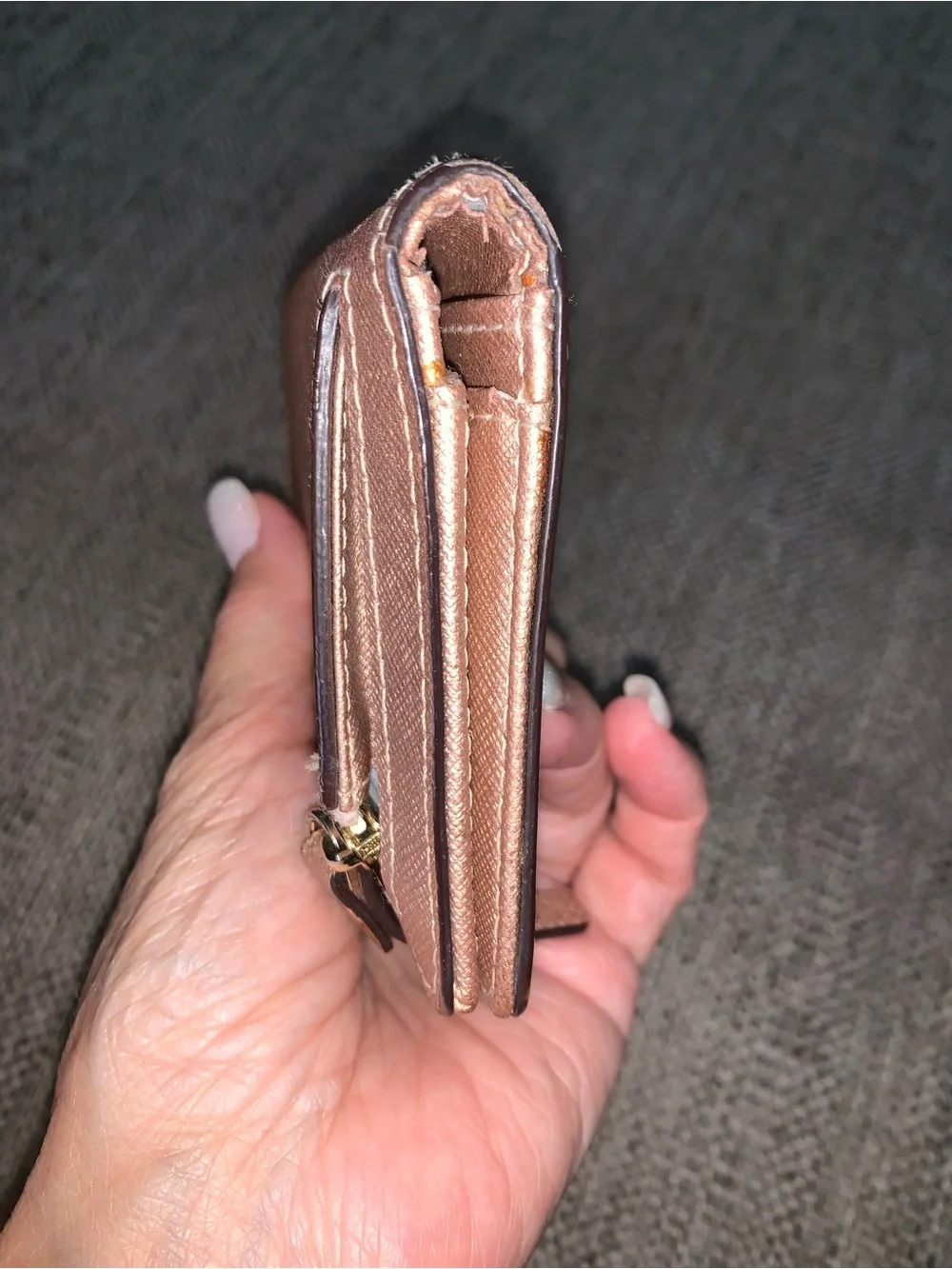 Kate Spade rose gold wallet with callouts